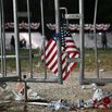 US flags are seen on the ground as people left the election night event for US Vice President and Democratic presidential candidate Kamala Harris